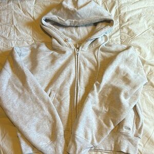 Size medium TNA zip up sweater